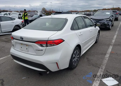 2021 Toyota Corolla Hybrid Le from USA, damaged, VIN JTDEAMDE0MJ017154